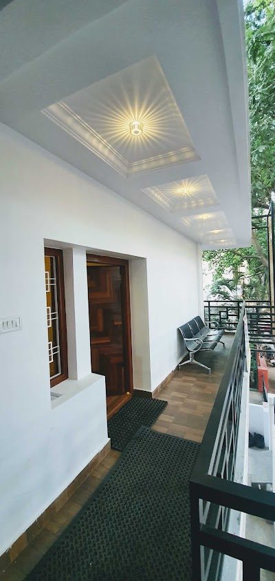 The Beehive Hostel — balcony corridor and seating