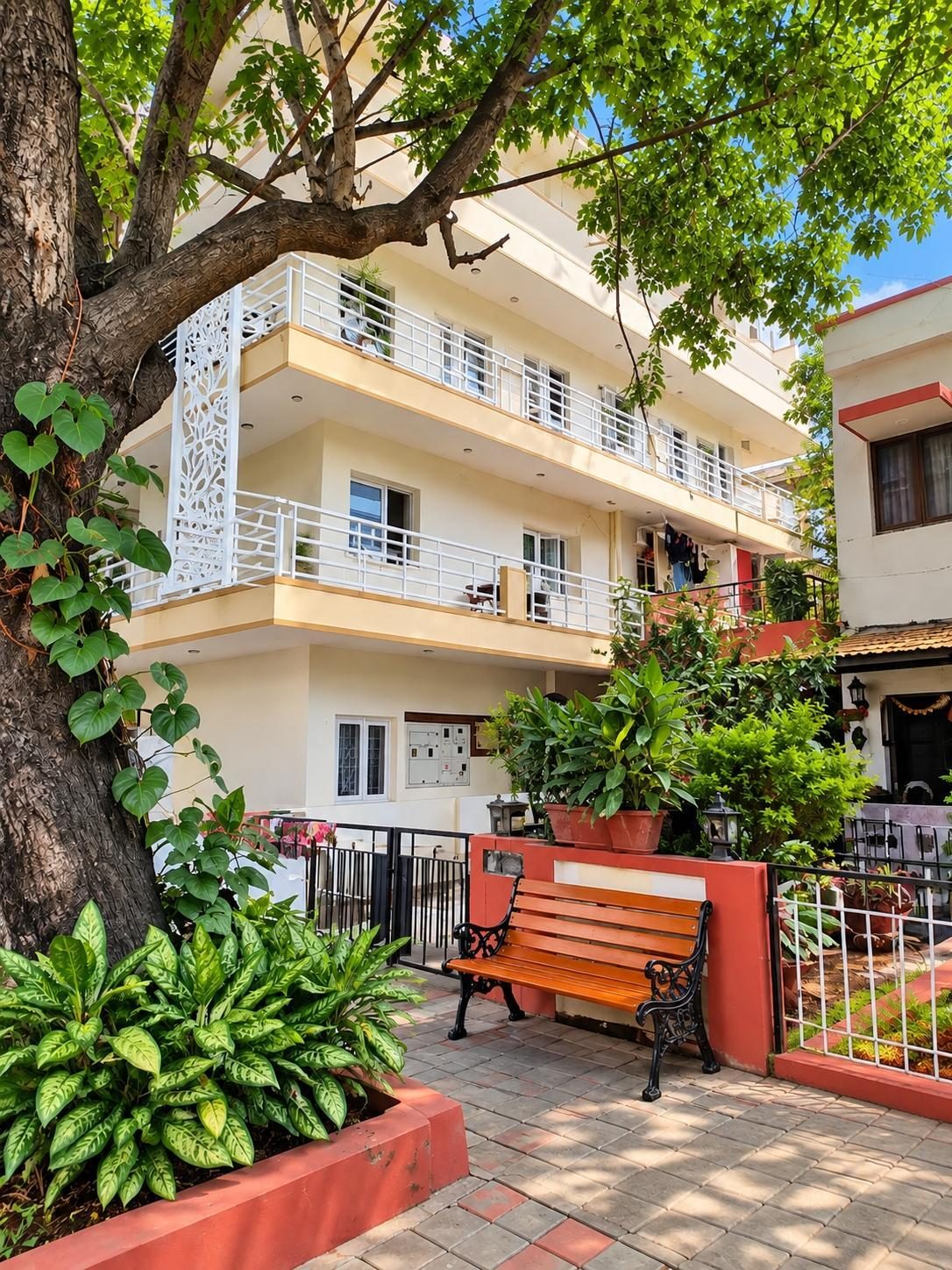 The Beehive Hostel — the building and front garden in Banashankari 2nd Stage