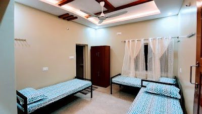 The Beehive Hostel — three-sharing room